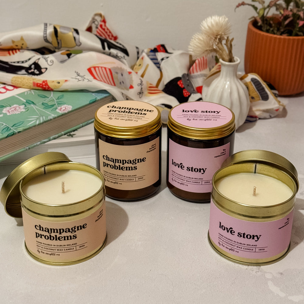 Spring 2025 limited edition candle collection – Love Story and Champagne Problems scents in tin and amber jar versions, floral and citrus-champagne fragrances, perfect for Swifties, made in Ireland
