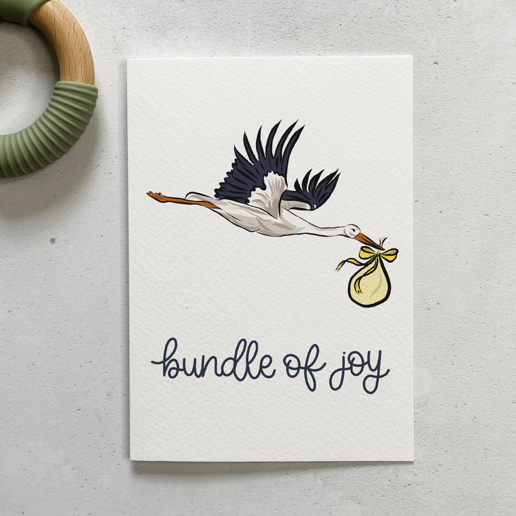 new baby card with an illustrated stork that says bundle of joy.
