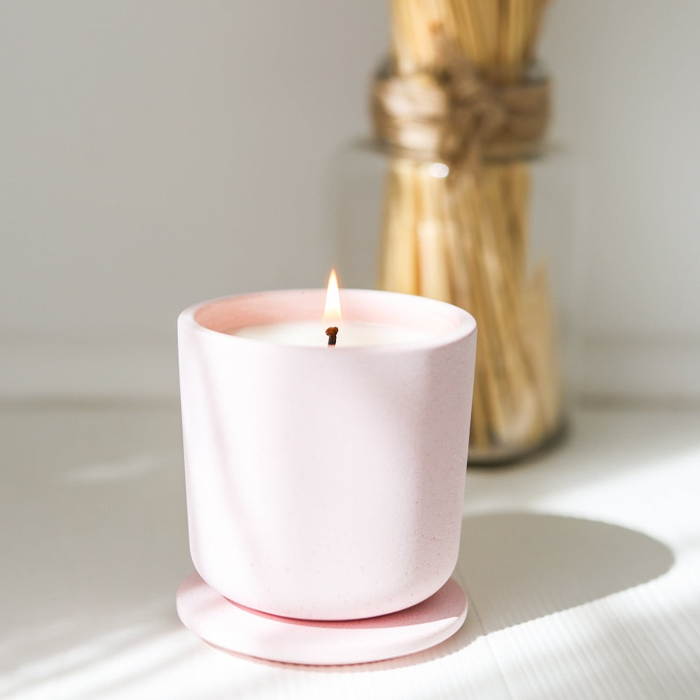 secret garden hand poured candle in our handmade pink jesmonite jar